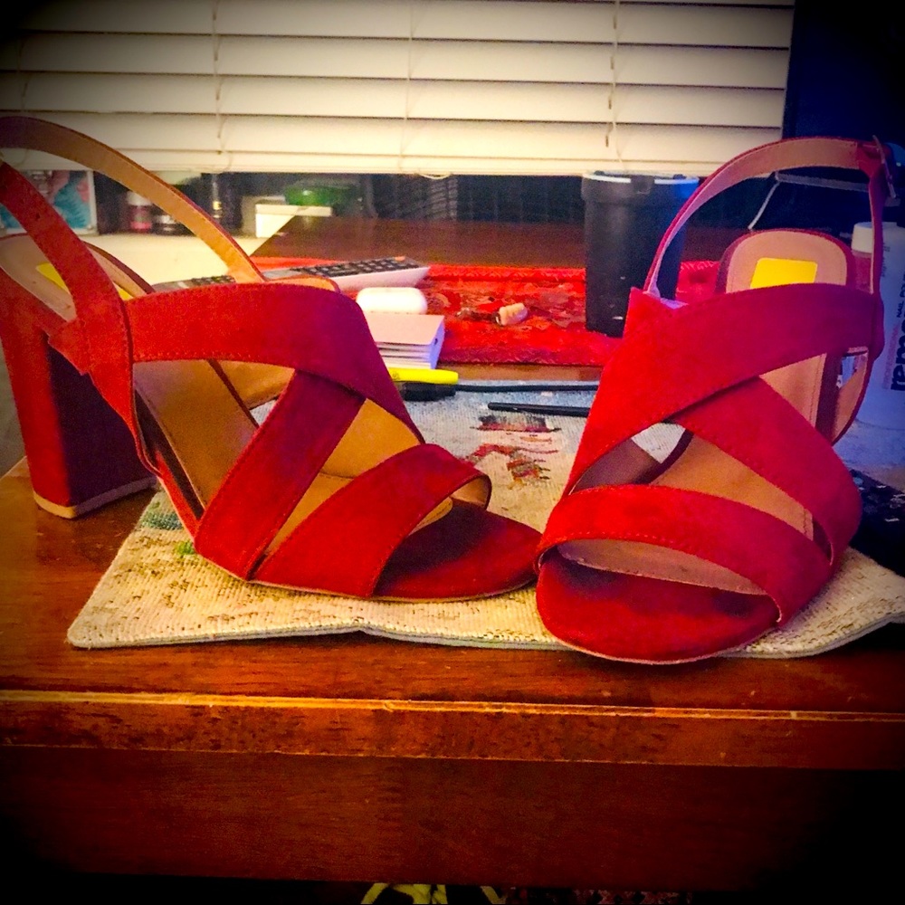 Red suede buckle heels